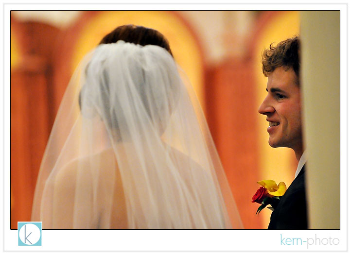 a colorful shot during their catholic reception (among our favorites style of weddings :) by kern-photo