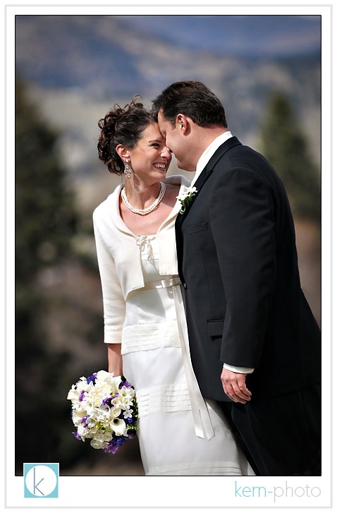 wedding with boulder flatirons in background by kern photo